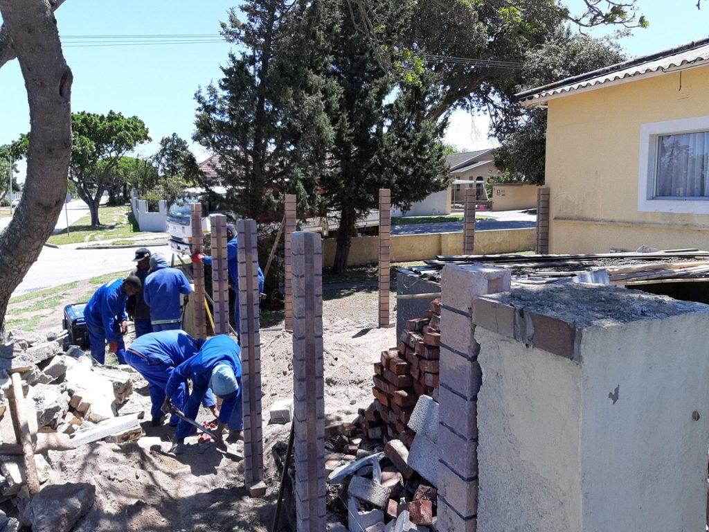 a group of people working on a construction site